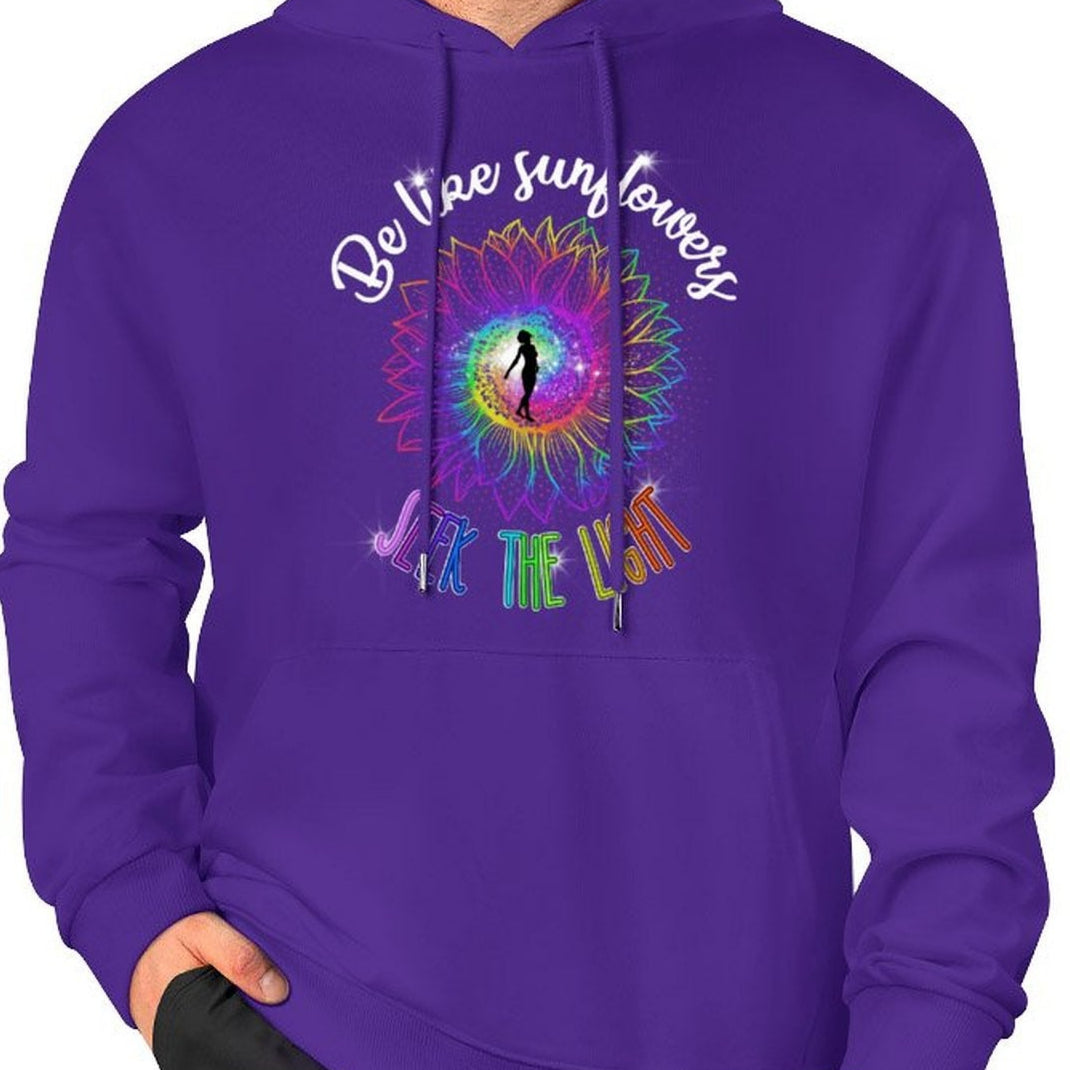 Person wearing a purple hoodie with a colorful design and text on a white background