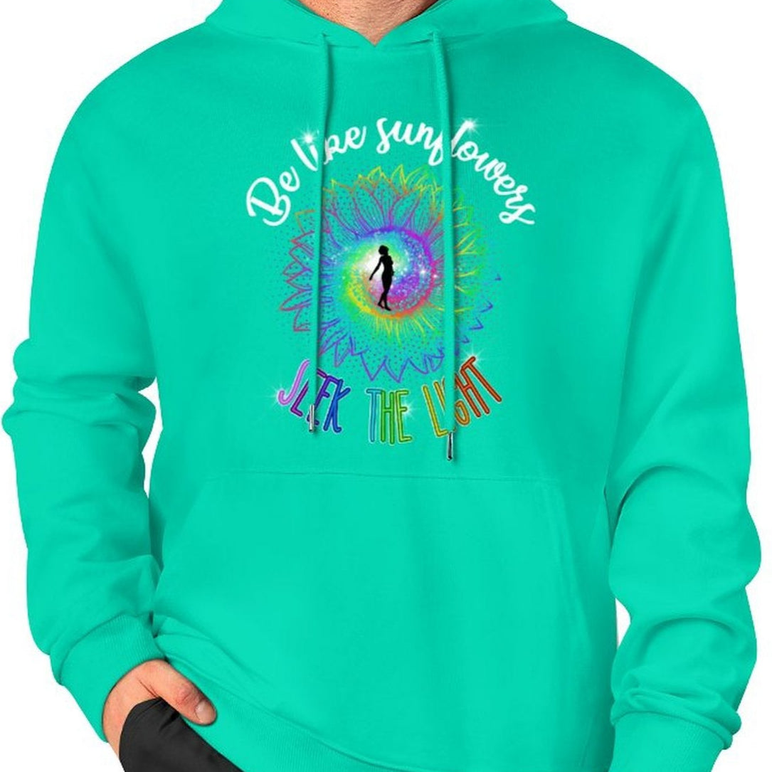 Person wearing a teal hoodie with a colorful design and text on a white background