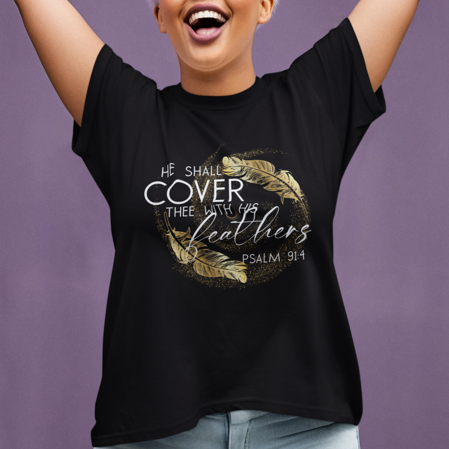 Woman wearing a black t-shirt with a design and text, raising her arms against a purple background