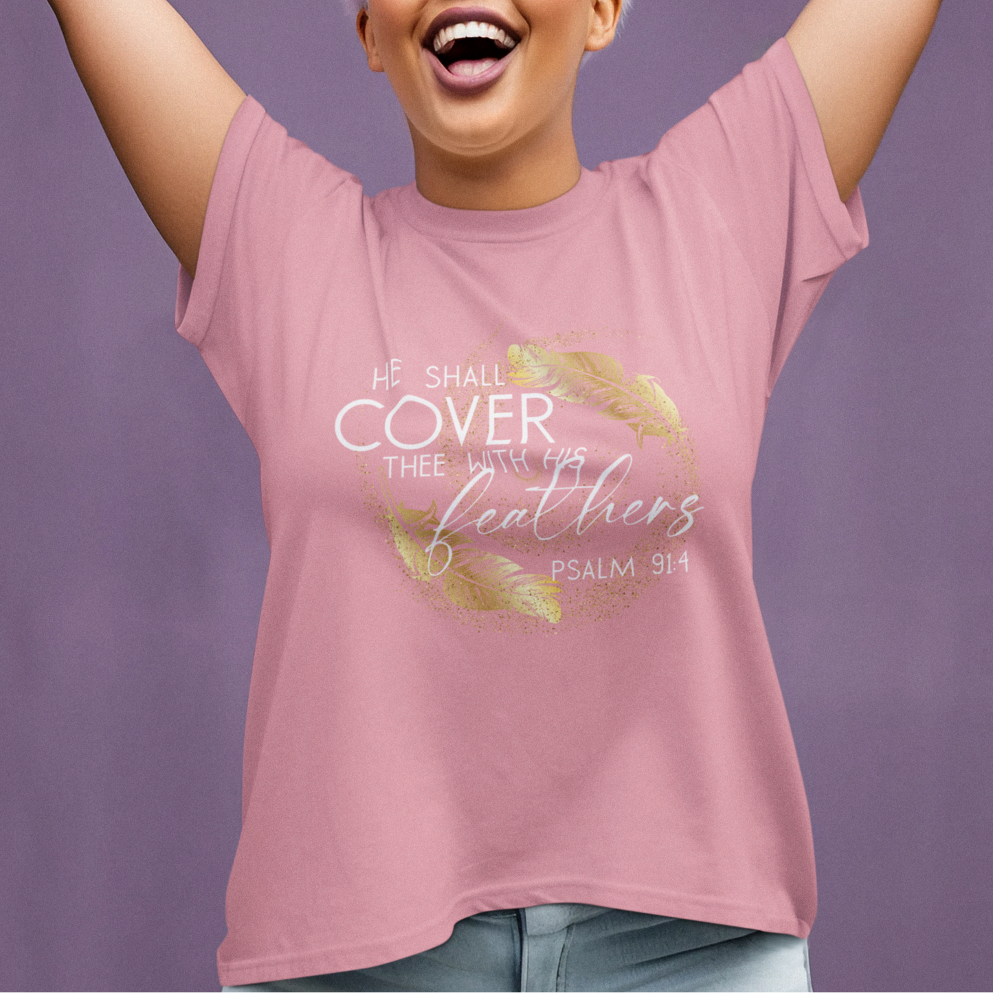 Woman wearing a pink t-shirt with a motivational quote against a purple background