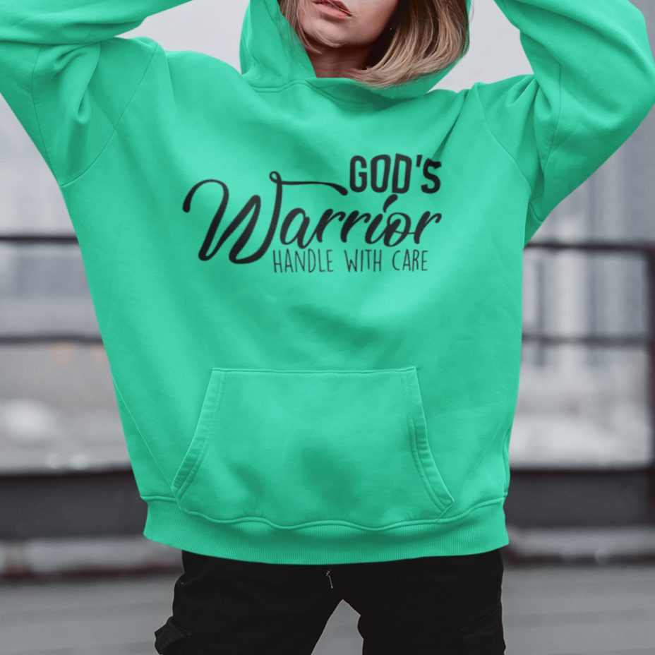 Person wearing a green hoodie with text, standing on a rooftop.
