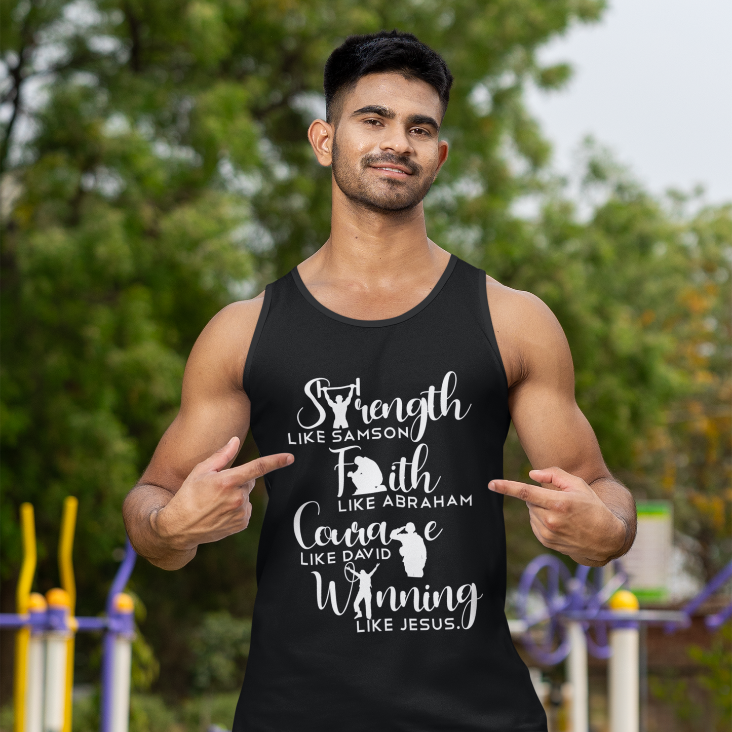 Man wearing a black tank top with motivational text outdoors