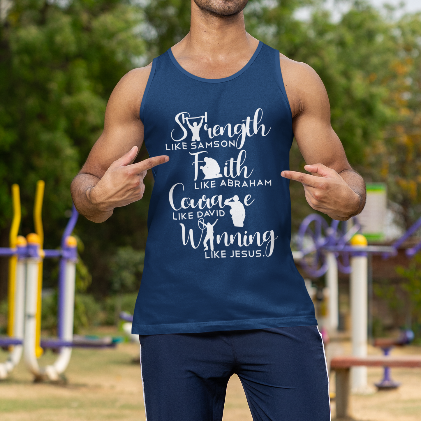 Man wearing a navy tank top with motivational text outdoors