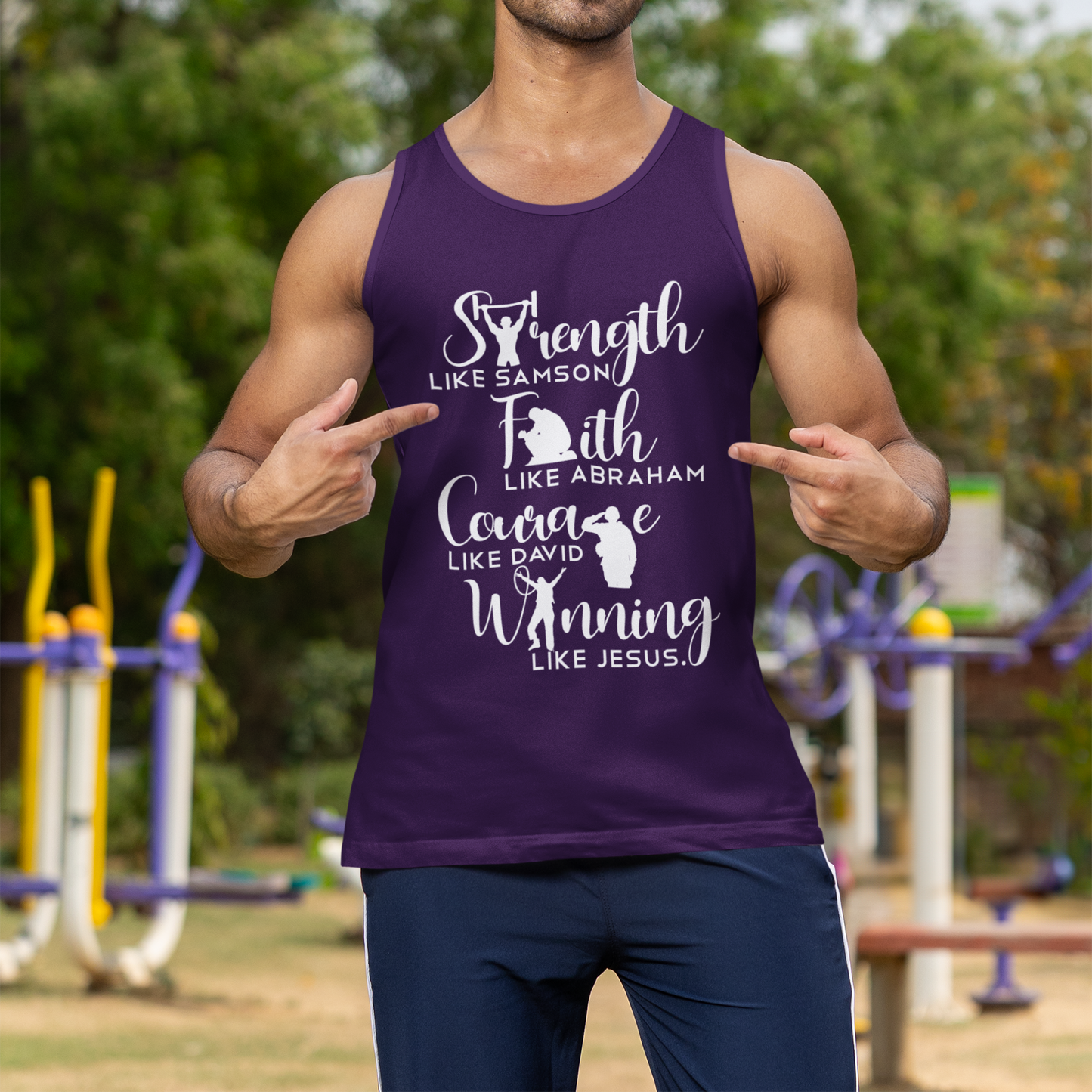 Man wearing a purple tank top with motivational text outdoors
