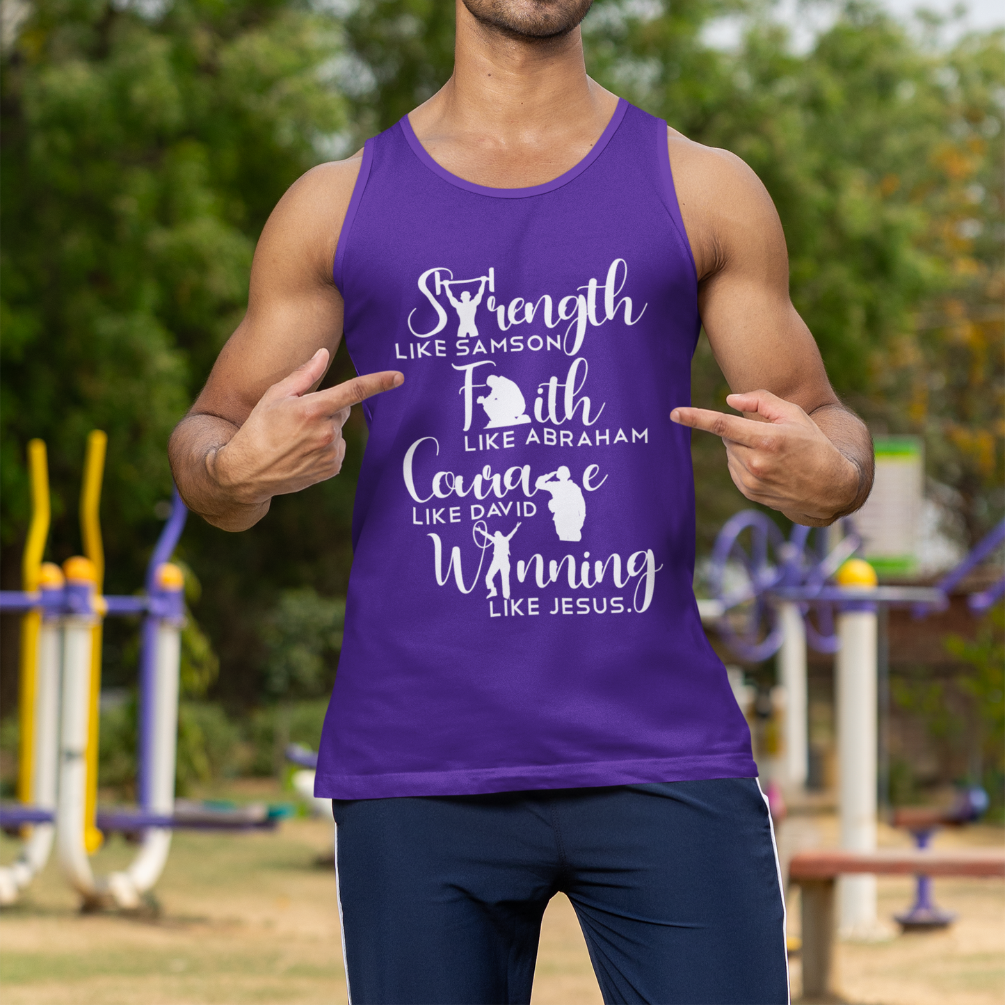 Man wearing a purple tank top with motivational text outdoors