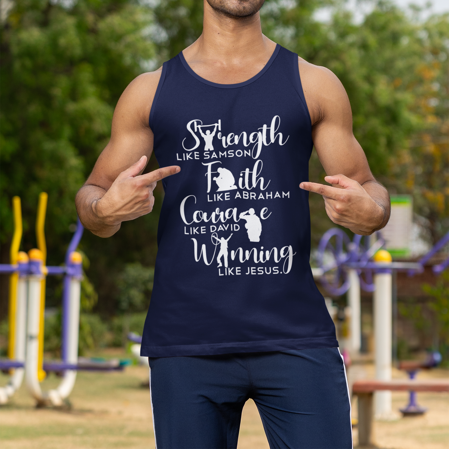 Man wearing a navy tank top with motivational text outdoors