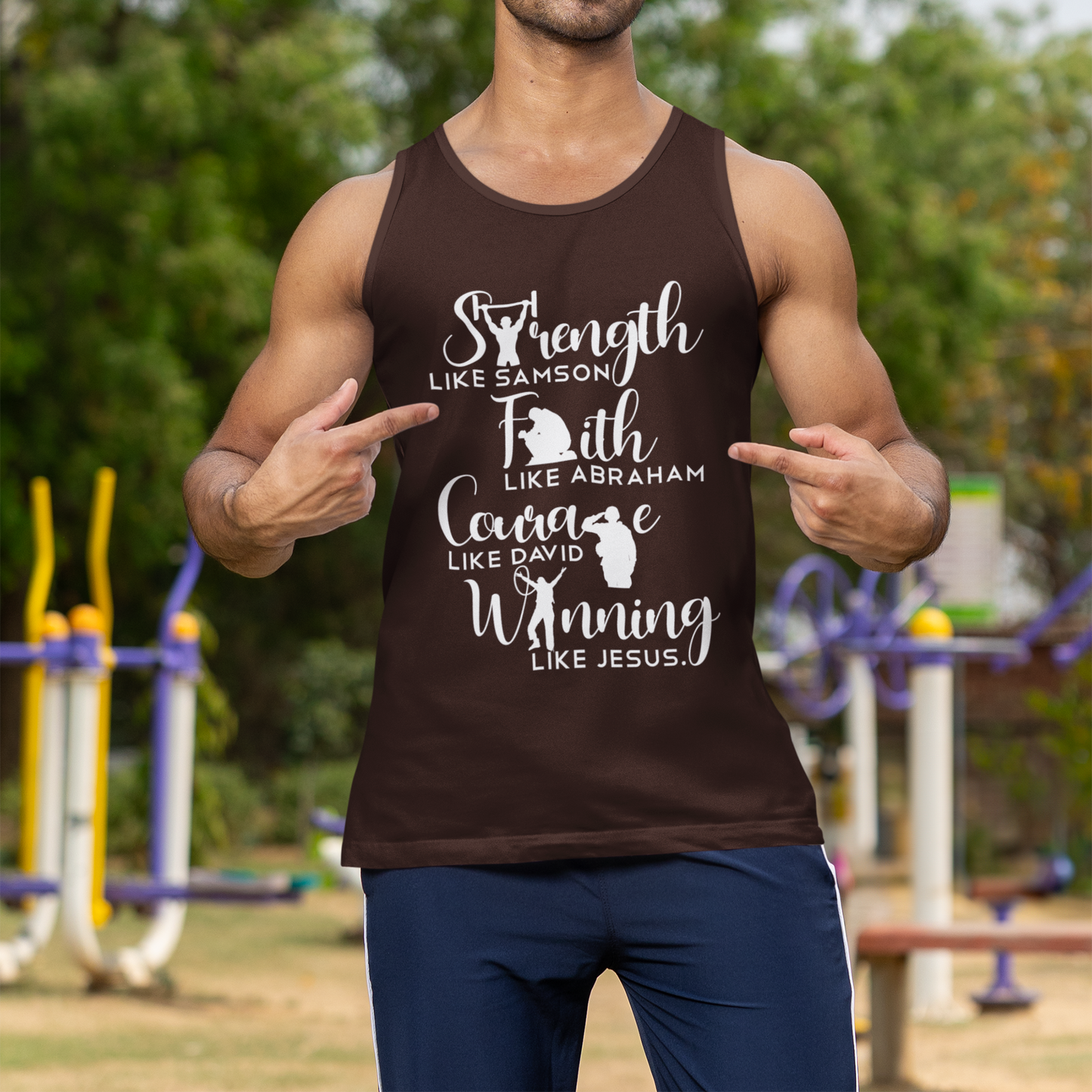 Man wearing a brown tank top with motivational text outdoors