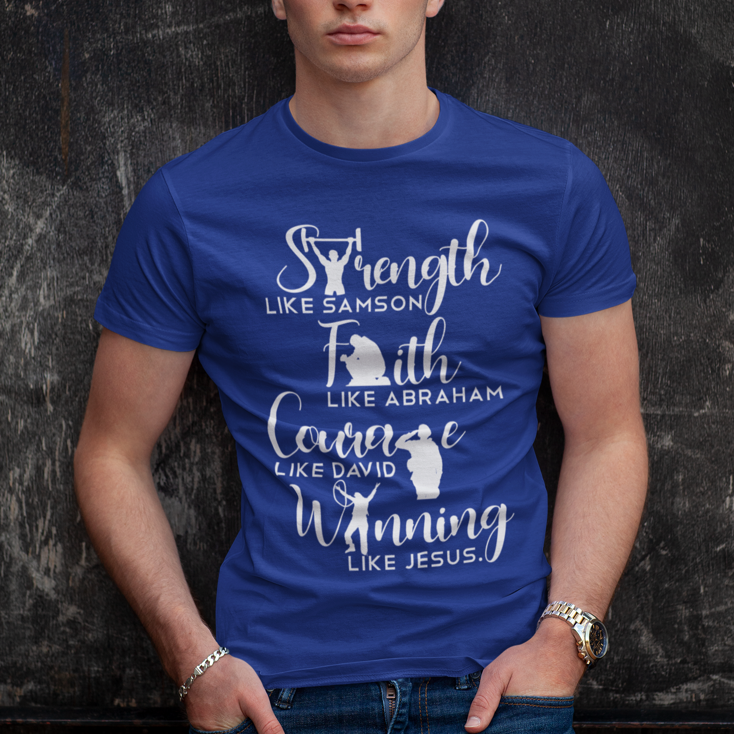 Man wearing a blue t-shirt with motivational text against a dark textured background