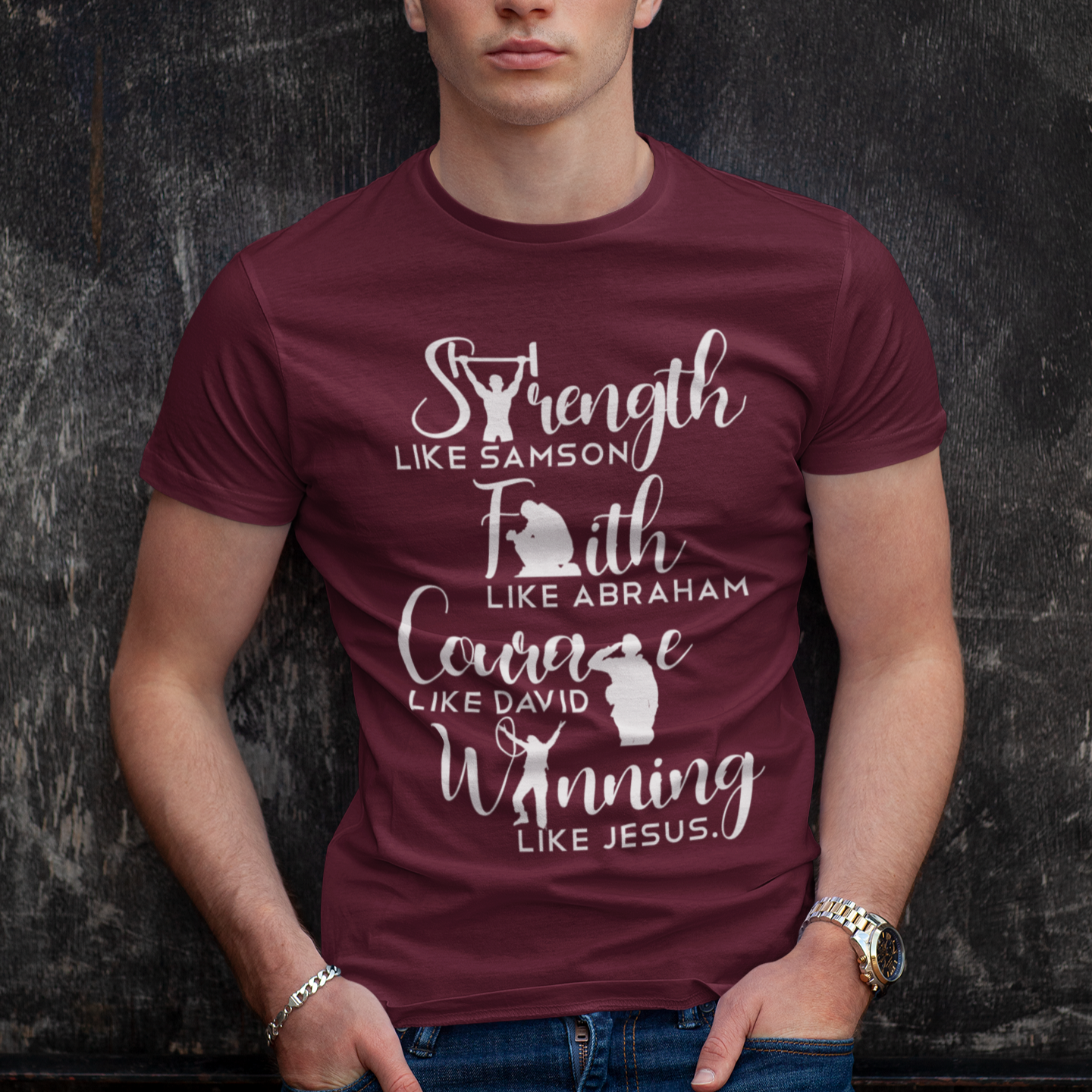 Man wearing a maroon t-shirt with motivational quote against a dark textured background