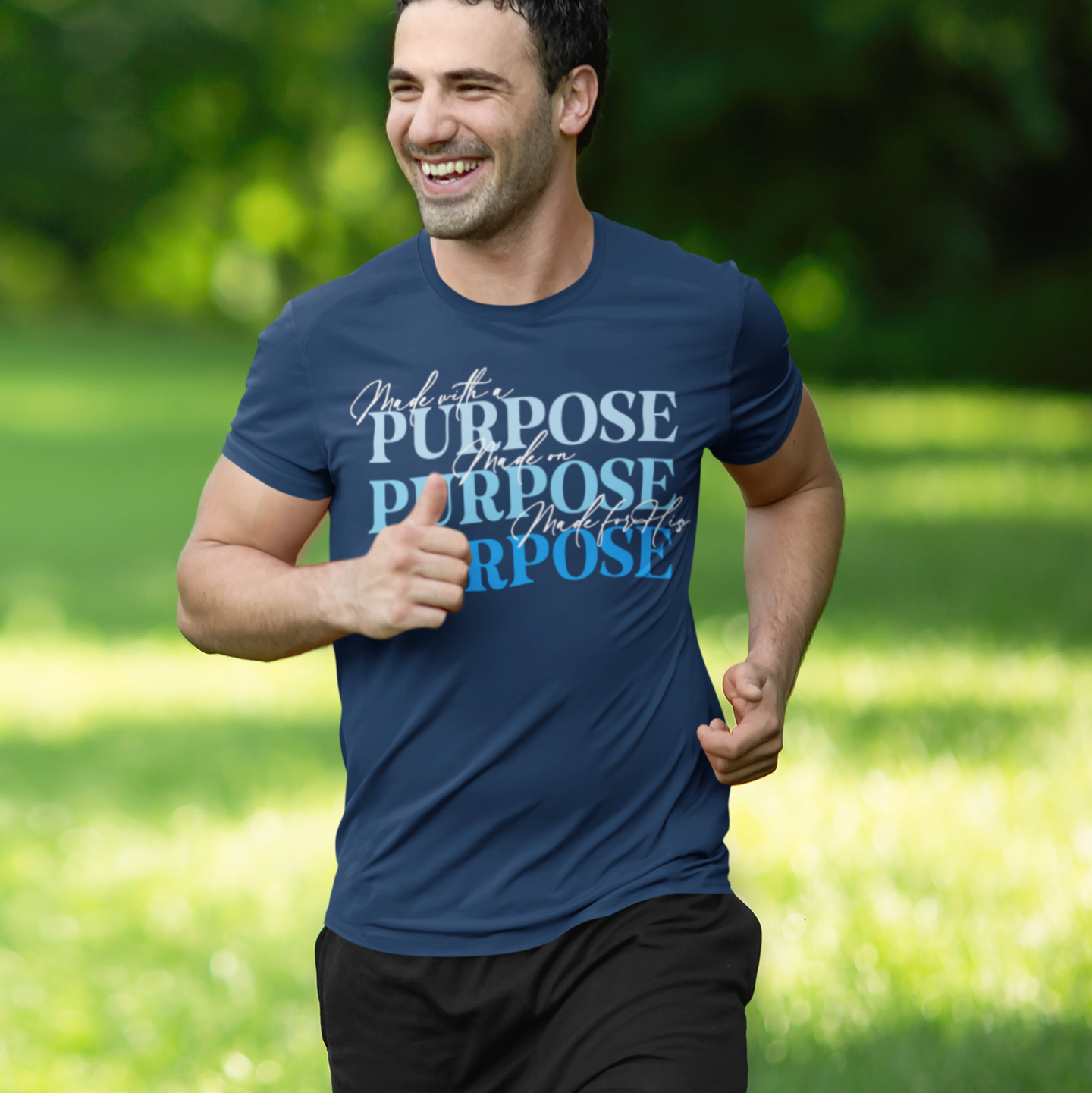 Man running outdoors wearing a blue t-shirt with 'Purpose' text