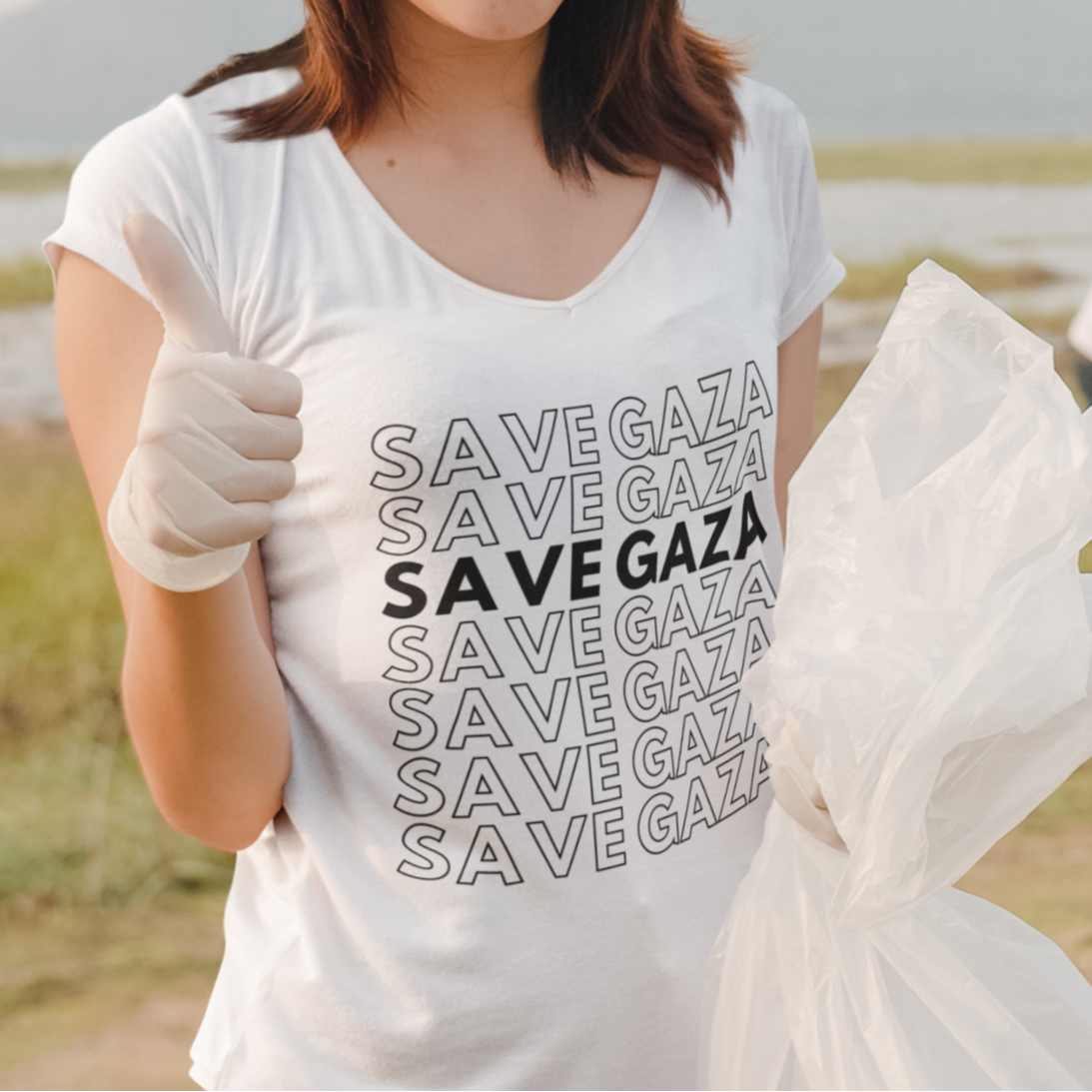 Person wearing a 'Save Gaza' t-shirt in an outdoor setting