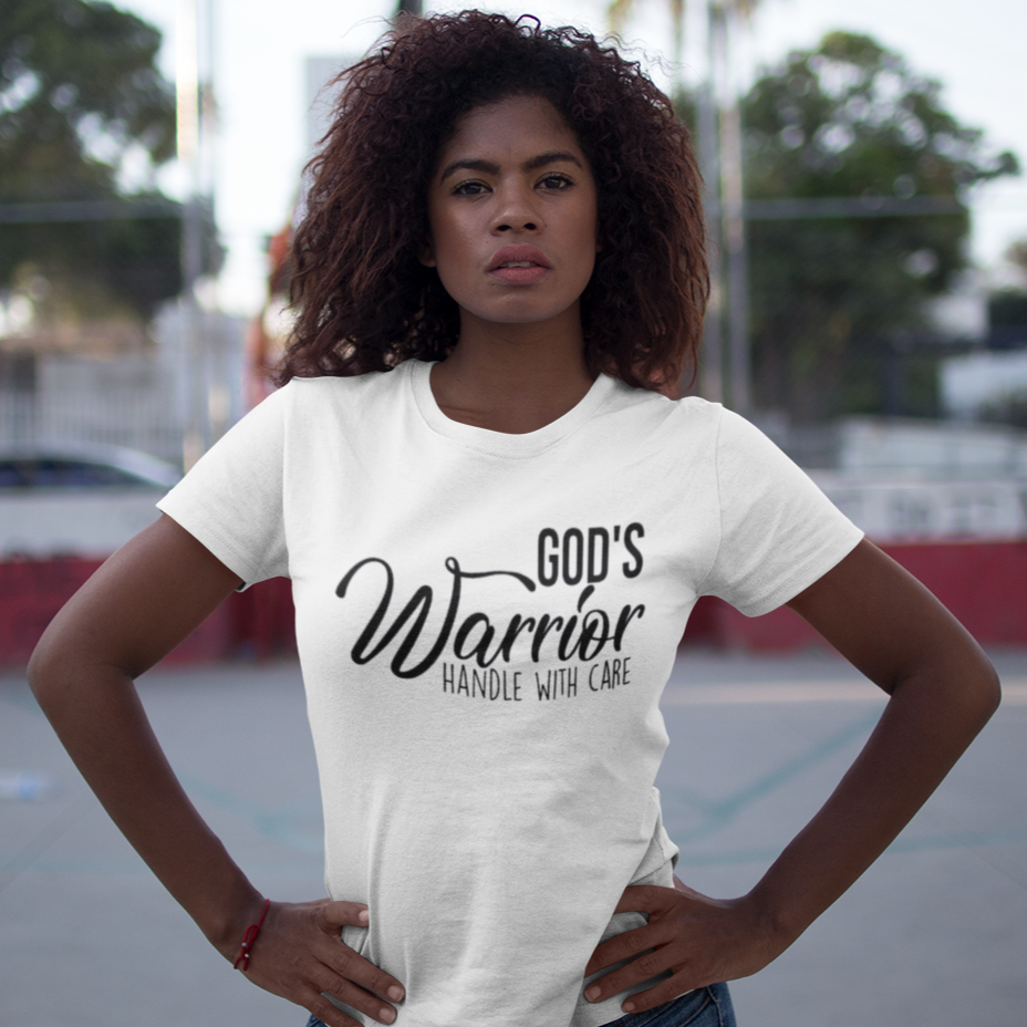 Woman wearing a white t-shirt with text standing on a court