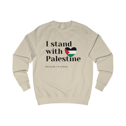 A beige unisex sweatshirt with text 'I stand with PALESTINE because I'm HUMAN' and a flag motif.