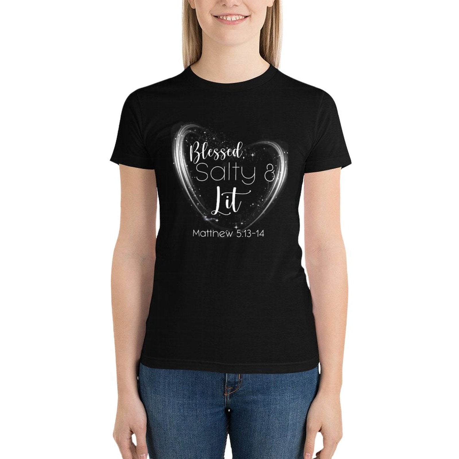 Person wearing a black t-shirt with a heart design and text on a white background