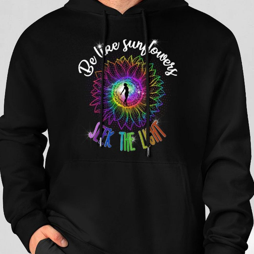 Black hoodie with colorful design and text on a gray background