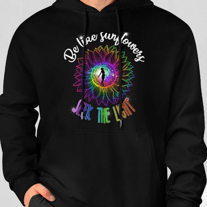 Black hoodie with colorful design and text on a gray background