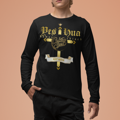 Person wearing a black long-sleeve shirt with gold text and black pants on a peach background