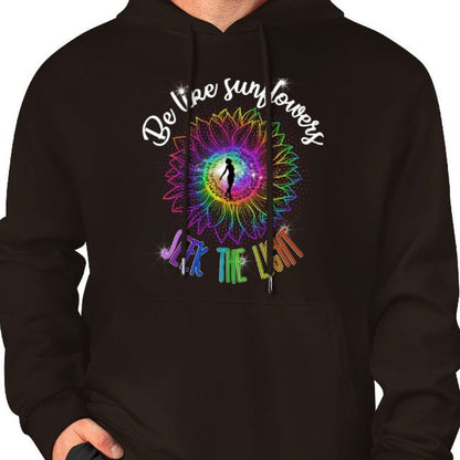 Black hoodie with colorful design and text worn by a person on a white background