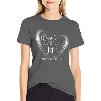 Person wearing a gray t-shirt with a heart design and text.