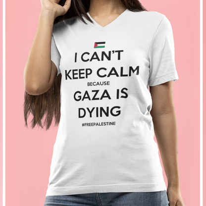 Person wearing a white t-shirt with a message on a pink background