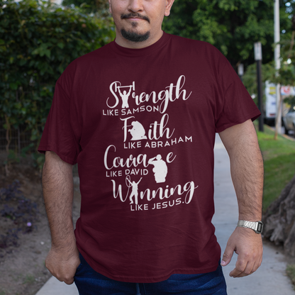 Man wearing a maroon t-shirt with motivational text and graphics outdoors.