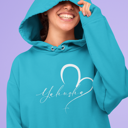 Person wearing a teal hoodie with 'Yahusha' design on a purple background