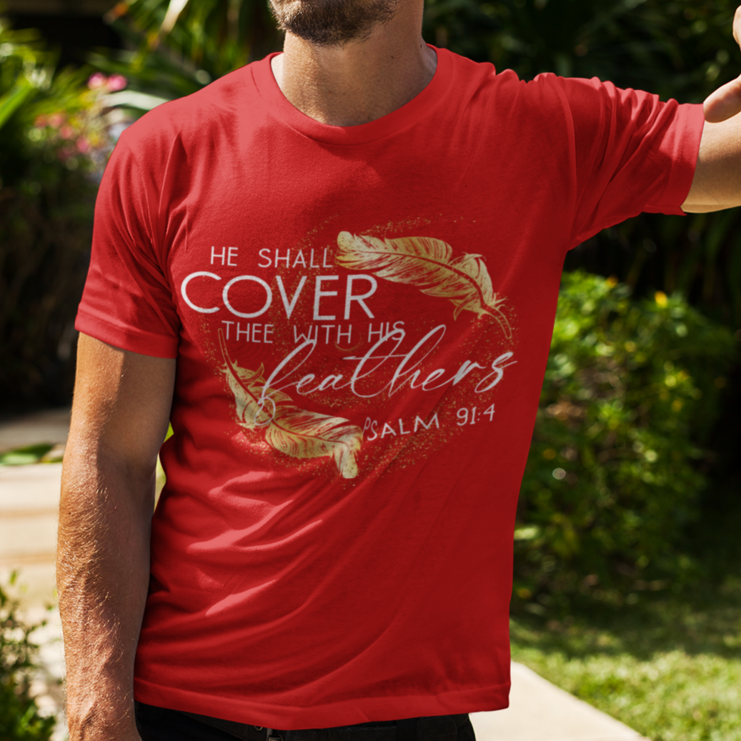Man wearing a red t-shirt with a motivational quote outdoors