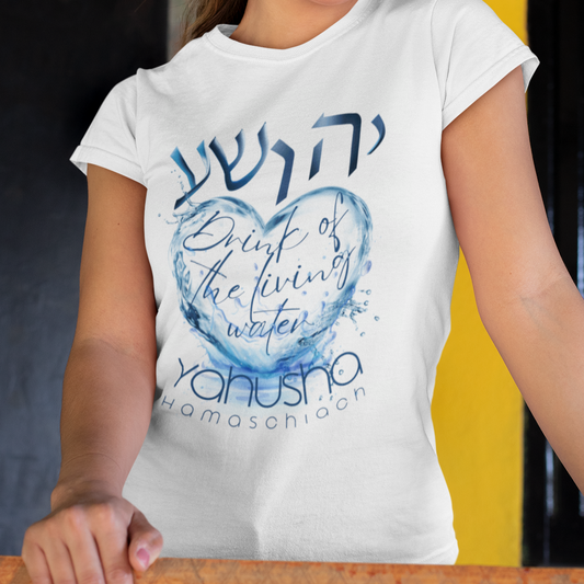 Woman wearing a white t-shirt with blue text and design, holding a wooden object.